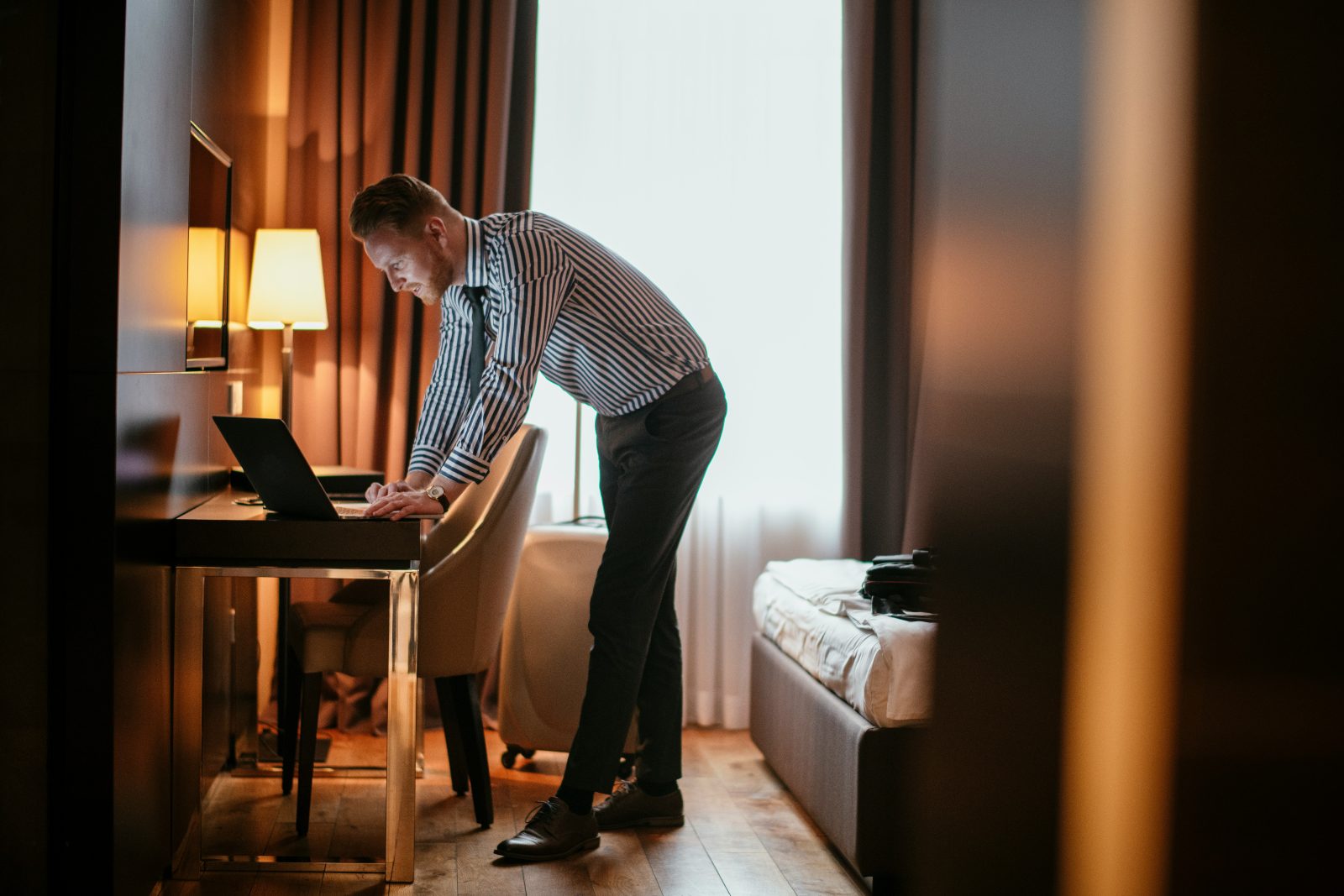 man in hotel room
